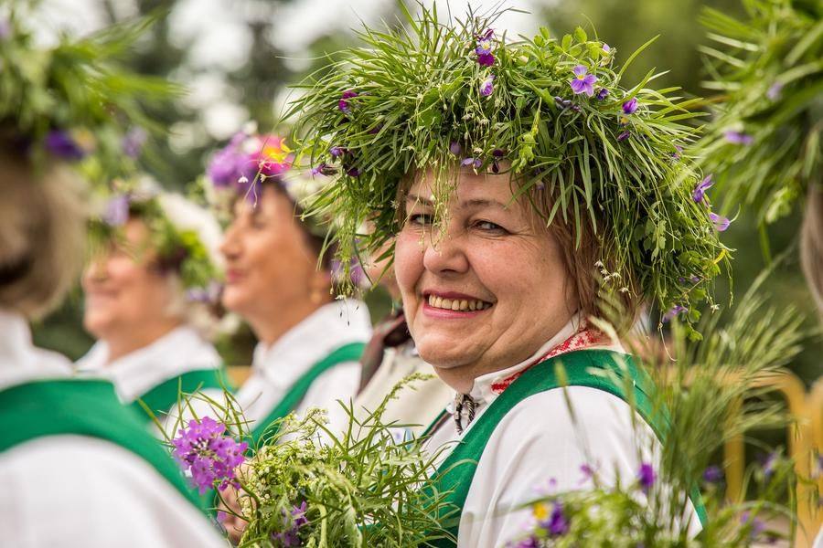 You can spot the Omsk Latvians by their wreaths made of wildflowers