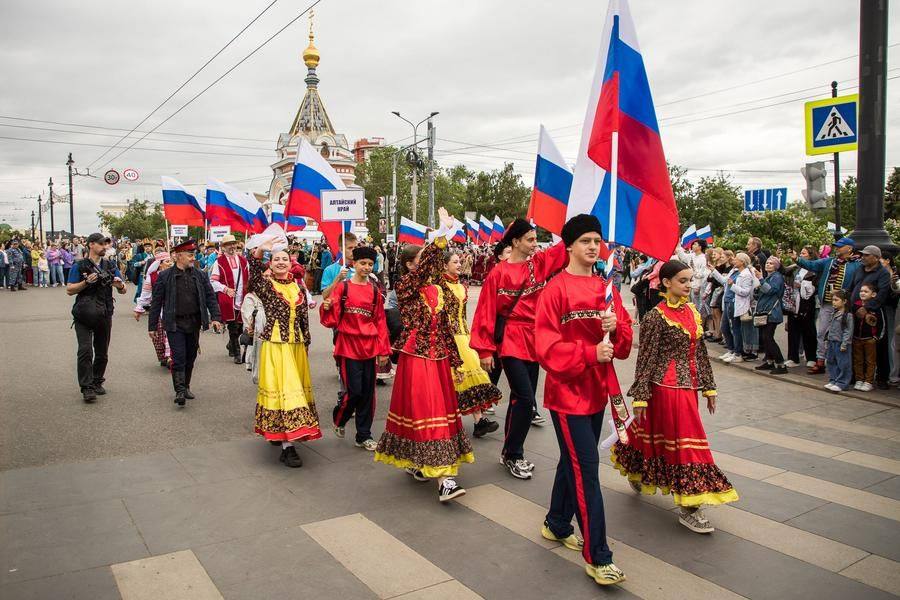 Today, the national flag is the main symbol of the festive procession
