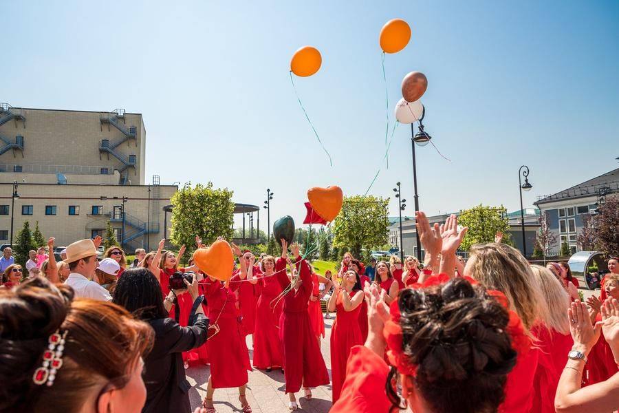 Balloons rise into the sky