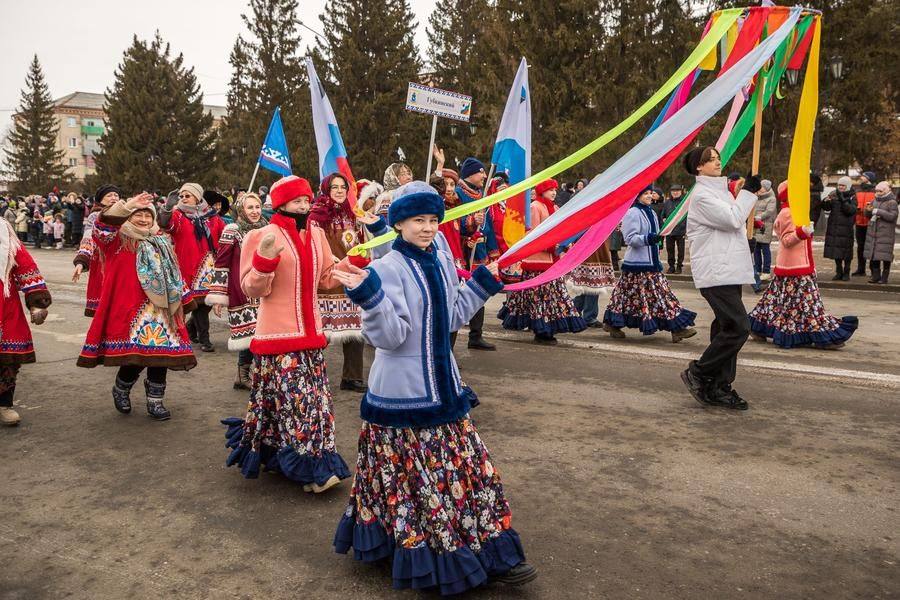 The delegations from twin cities stand out in the column — guests from Gubkinsky