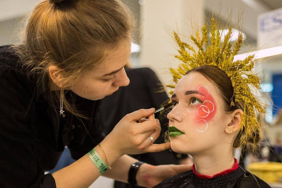 The other group works on fantasy makeup themed “Fairy-Tale Beauty”