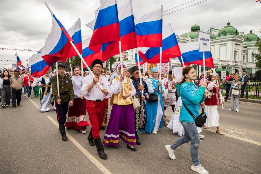 Sometimes, the wind makes the flags seem to form a canopy over the marchers