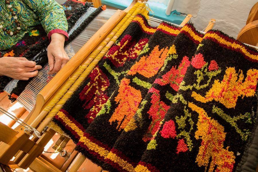 The craftswomen weave them by hand on a special loom
