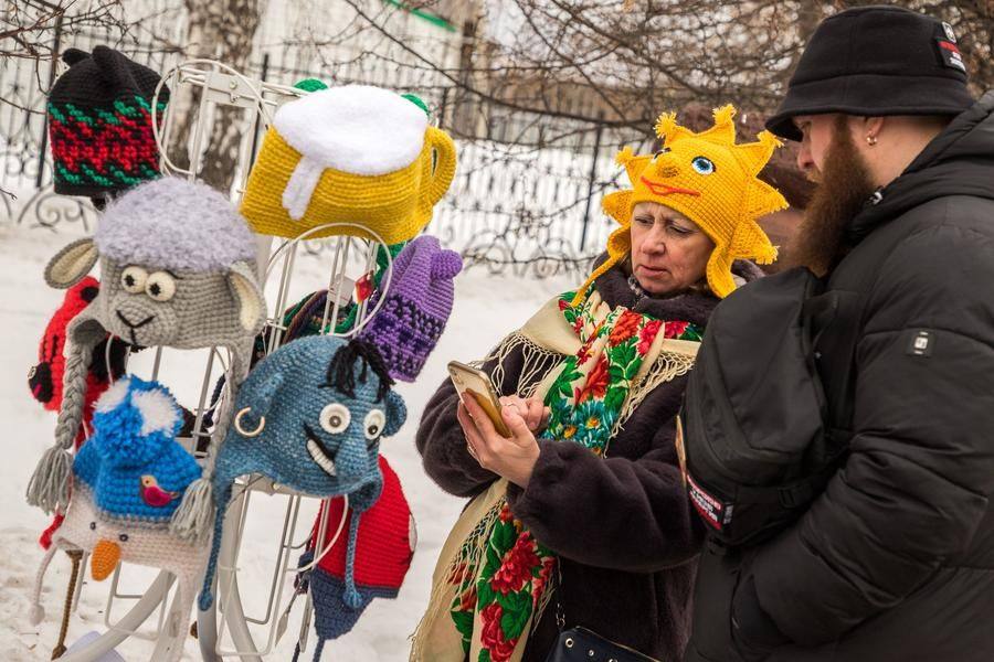 Craftsmen eagerly offer souvenirs and small goods to all passersby