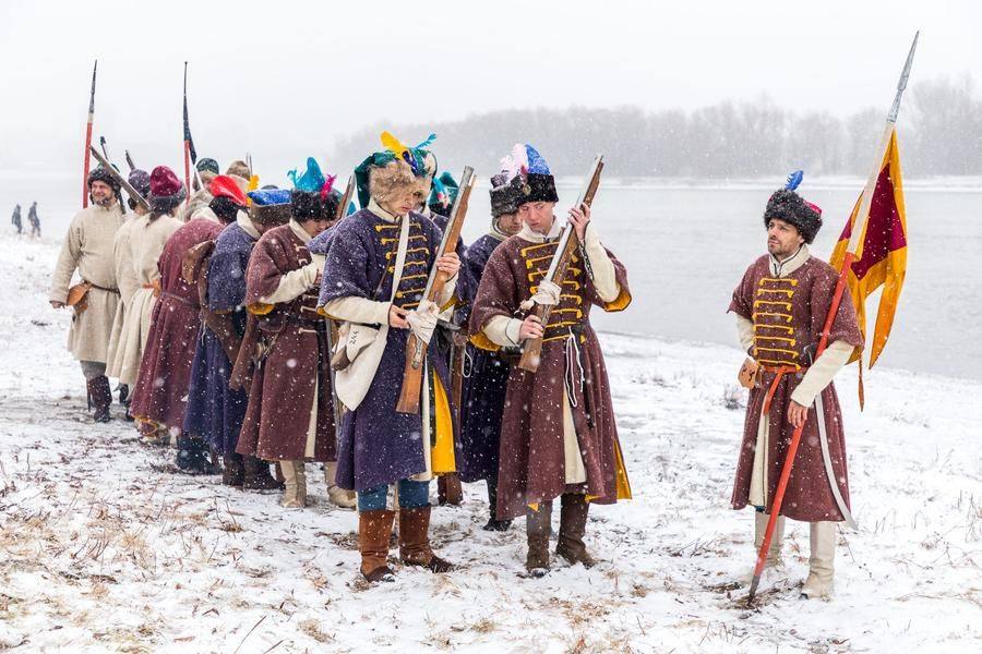 November weather adds to the challenge: the garish Poles inspect their weapons