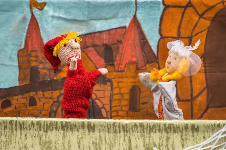 A puppet theater under the open sky offers a glimpse into the past