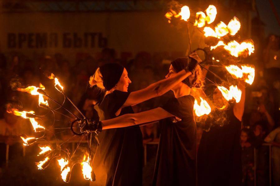 With proper skill, a fire fan allows safe proximity to partners