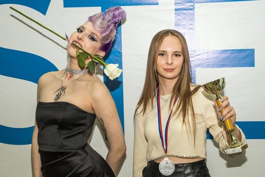Tired but happy, the winners are still ready to pose in unconventional ways