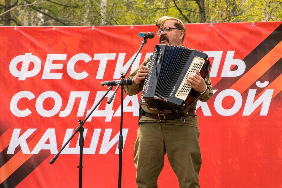 Wartime songs ring out from a small festival stage of its own
