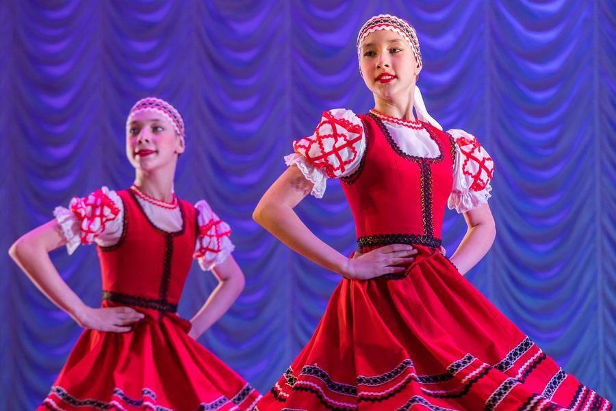 Now they appear as Belarusian girls, performing the dance “Krutuha”