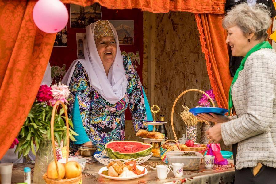 The hostess is happy when everyone finds the food to their taste