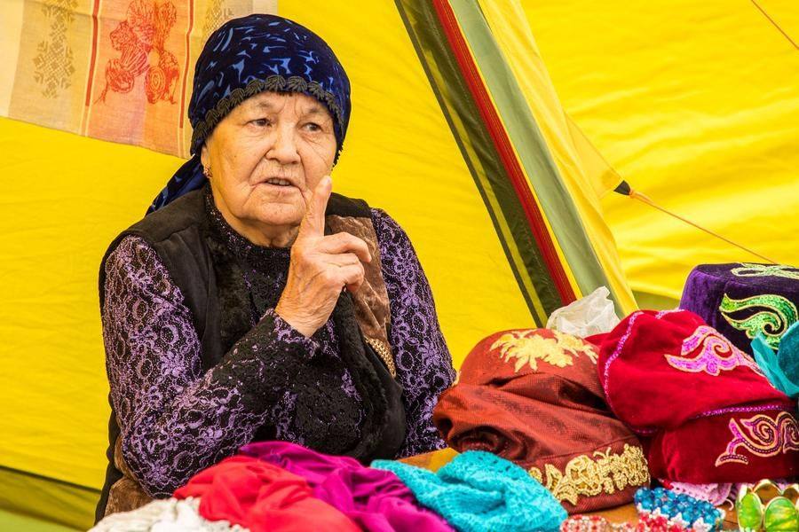 The craftswomen not only sell their wares but also offer words of wisdom