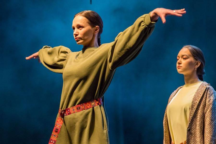 Artists from the “Irtysh Sunrise” ballroom dance ensemble take part in the fashion show