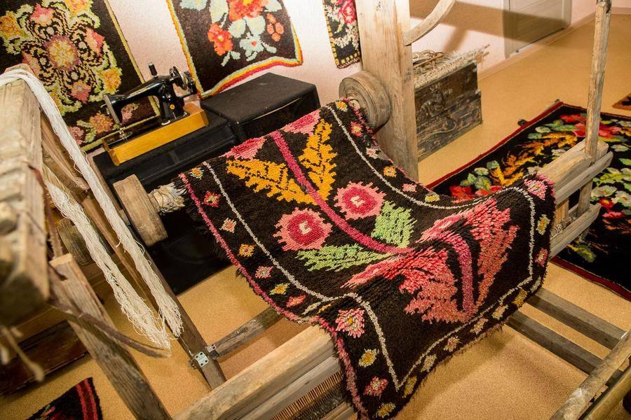 The second floor of the Cultural Center displays historical carpets