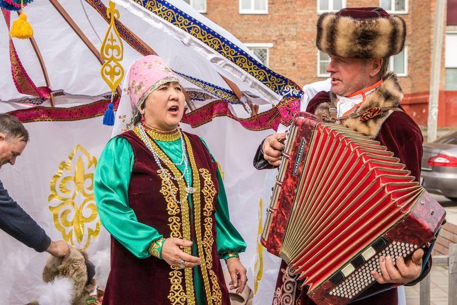Folk songs are heard everywhere (at some distance from the stage)