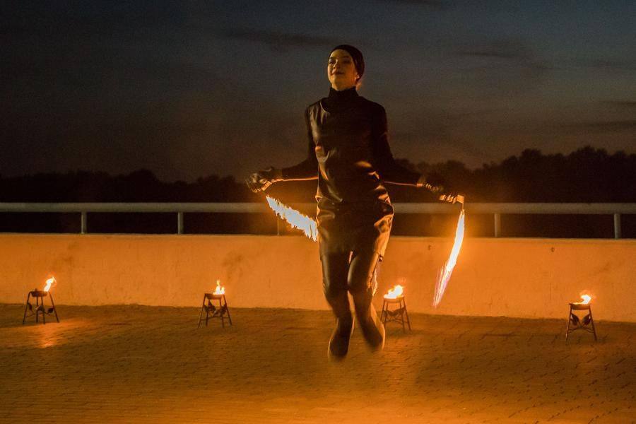 By the way, the flaming jump rope is her creative invention
