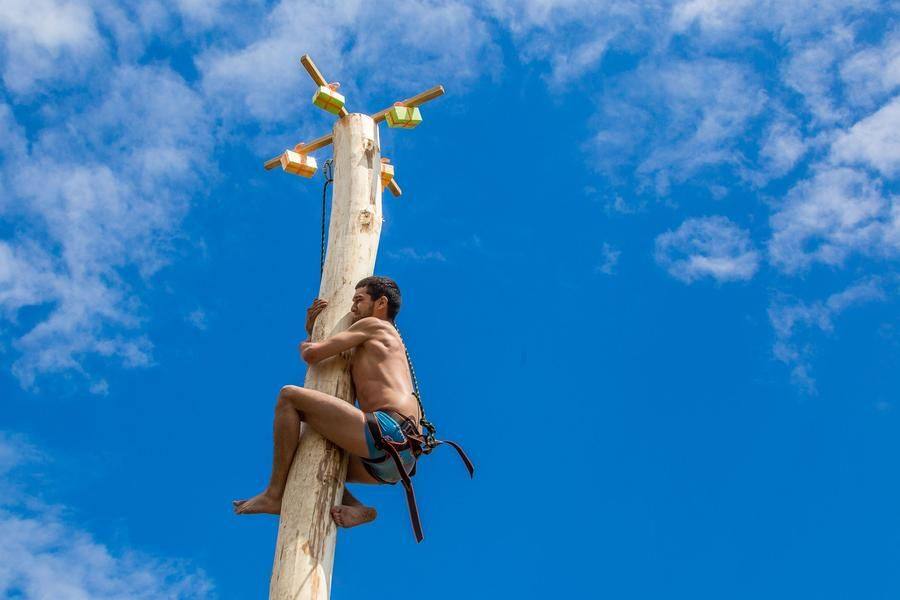 It takes him less than a minute to reach the top