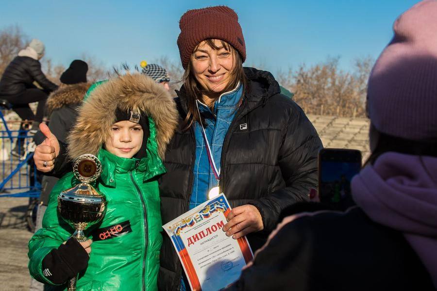 Kids want to take photos with the winner — this is how a love for motorsport begins