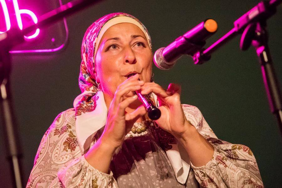 Being able to play more than one folk instrument is the norm for them