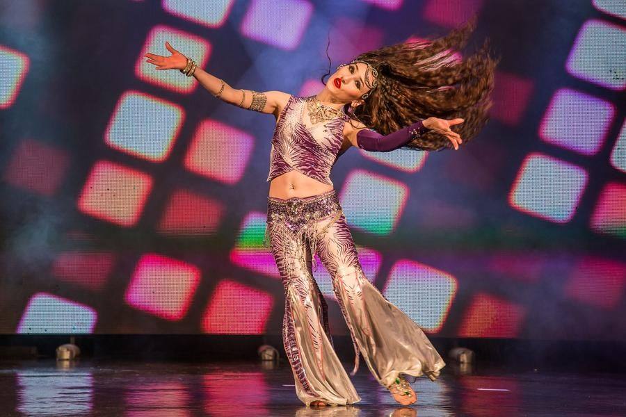 A hair toss is one of the most striking techniques in tabla