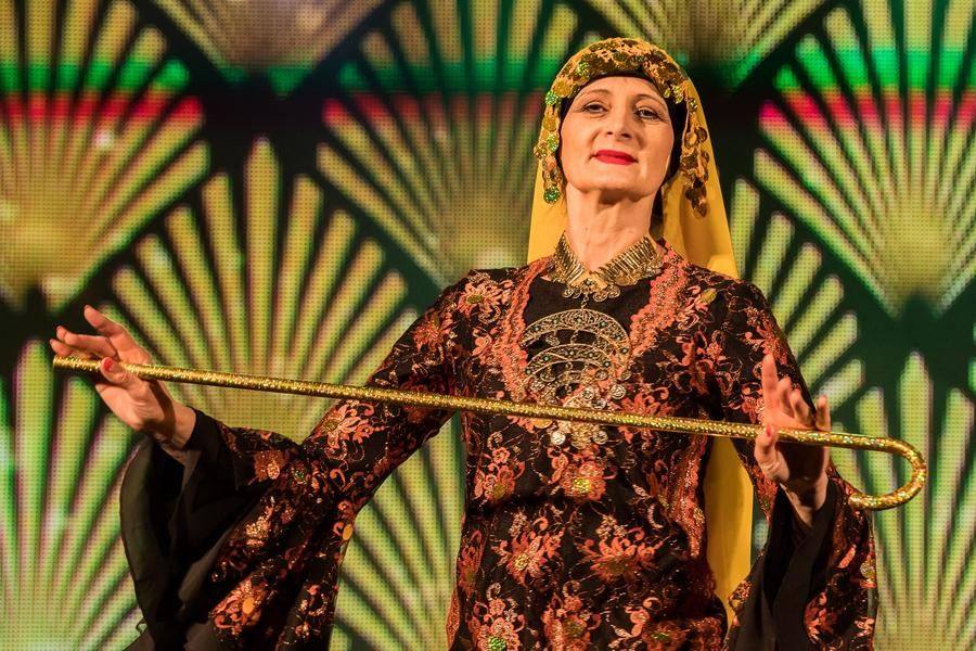 This time she performs Saidi — a folk dance with a cane