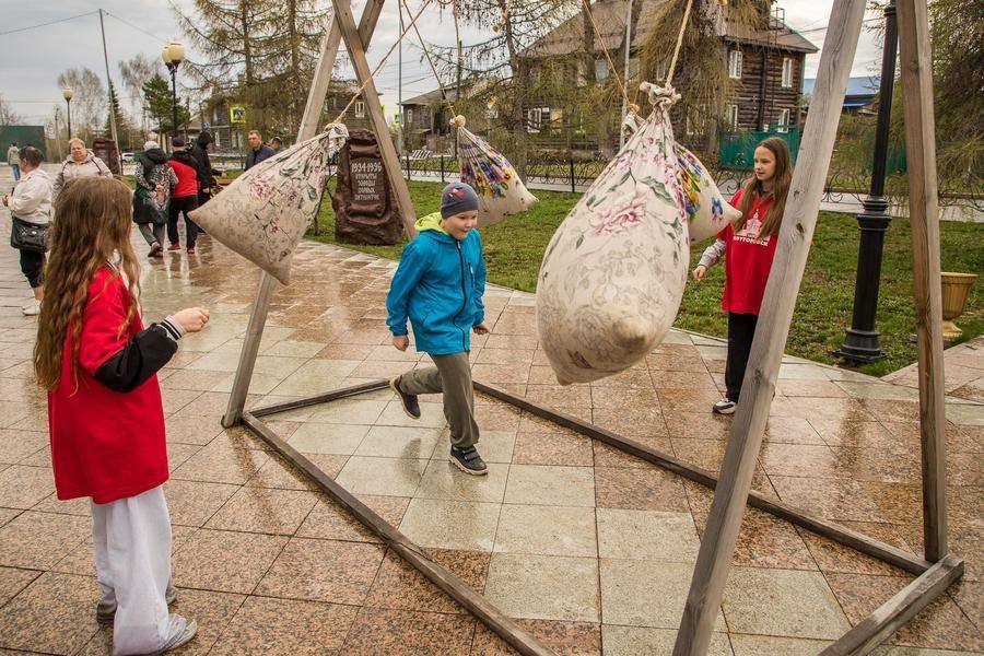 Yet another station challenges visitors to run between swinging sacks