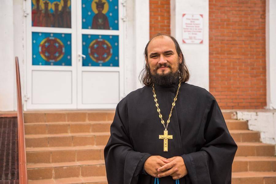 Father Sergiy welcomes guests — a baptism ceremony is scheduled here today