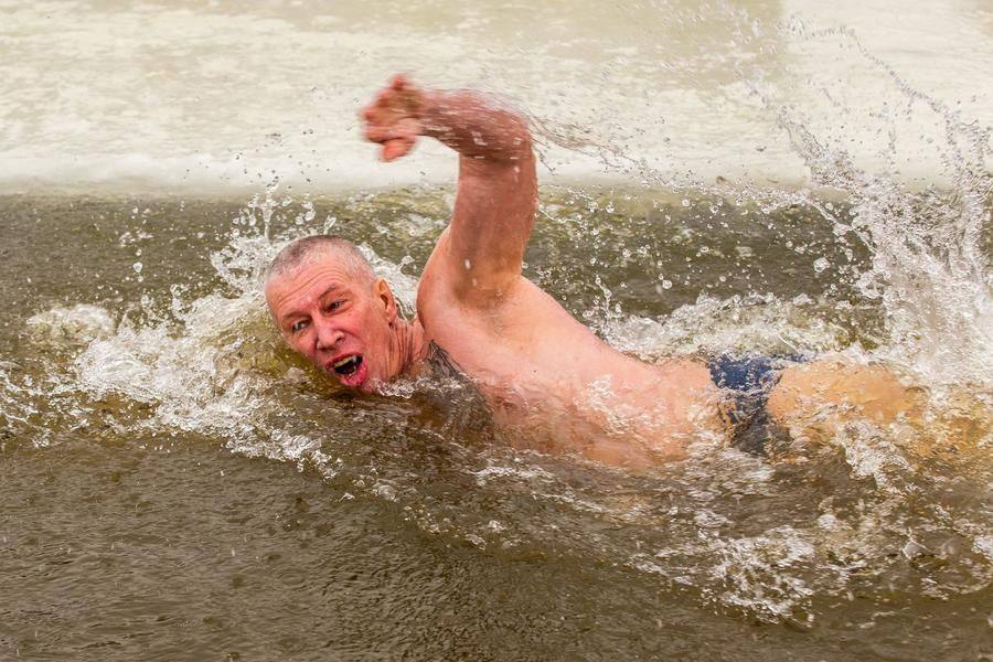 Covering 25 meters in an ice hole takes character — and years of training