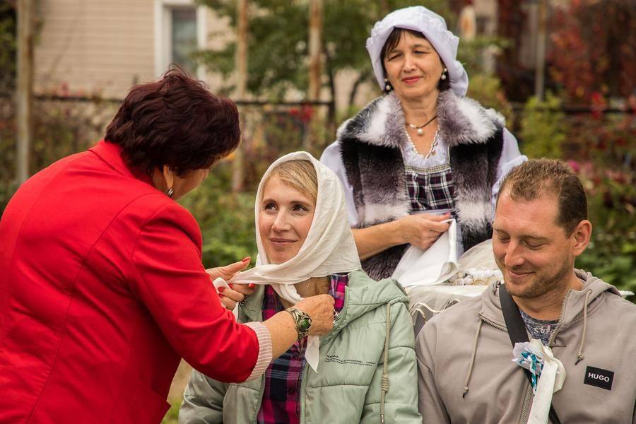 The headscarf is a symbol of a married woman: it was tied so that not a single strand of hair showed, for only her husband