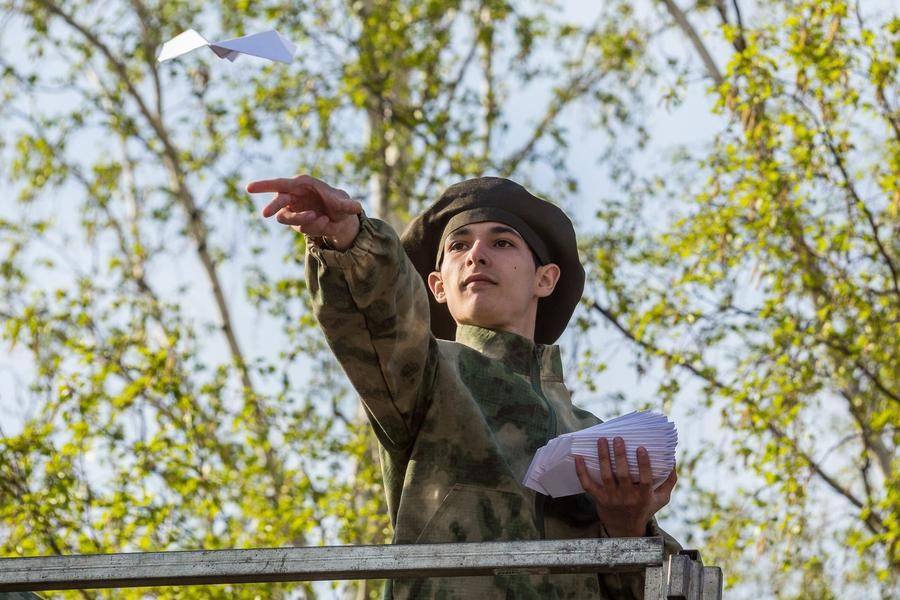 Paper planes as symbols of peace — a wonderful directorial touch