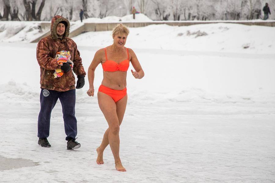 Every ice swimmer could probably use a personal “squire”