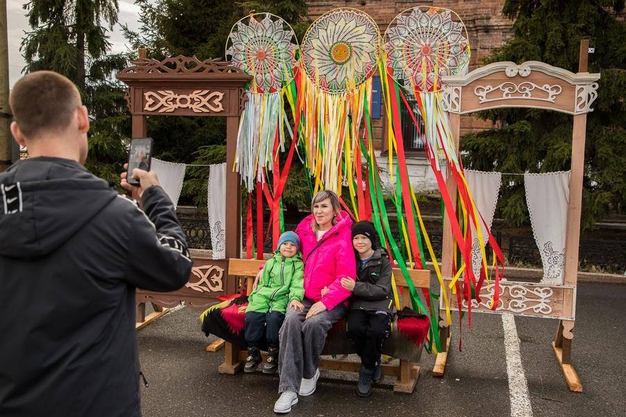 Themed photo zones are set up all across the square