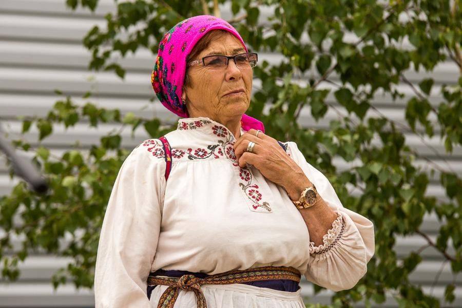 The headdress indicates the social status of its wearer