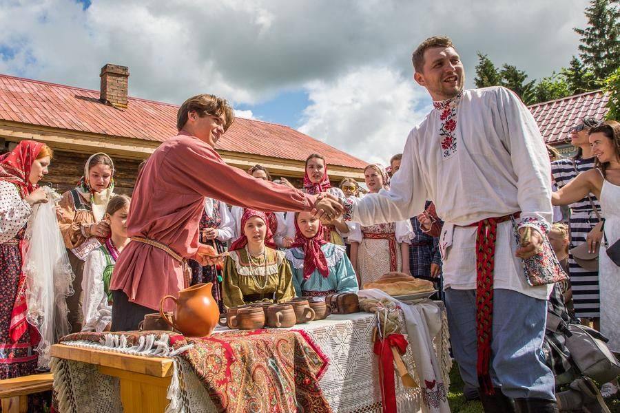 The ransom has been paid, and the bride’s brother shakes hands with the groom’s best man