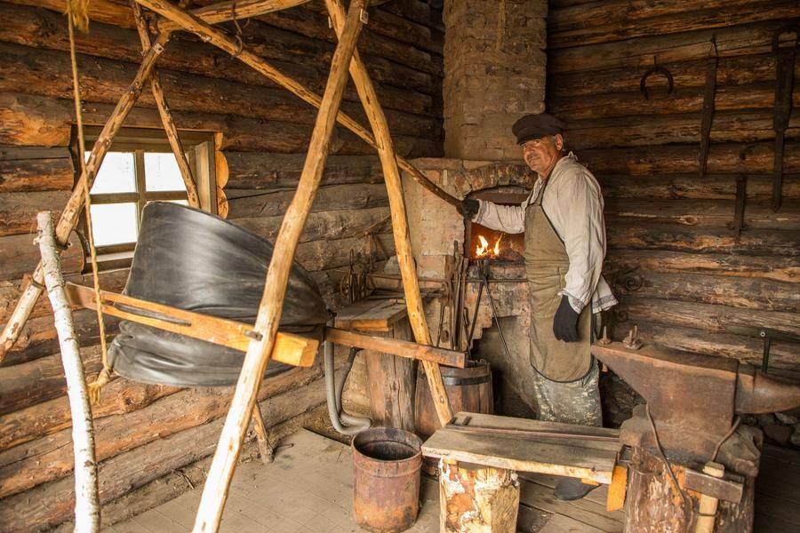 He gladly explains how the metal is heated to give it the desired shape