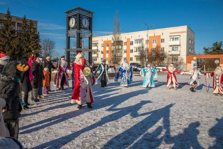 A circle dance will help keep everyone warm — though the day is unusually mild for November in Siberia