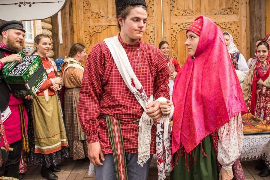 The towel still binds the couple’s hands