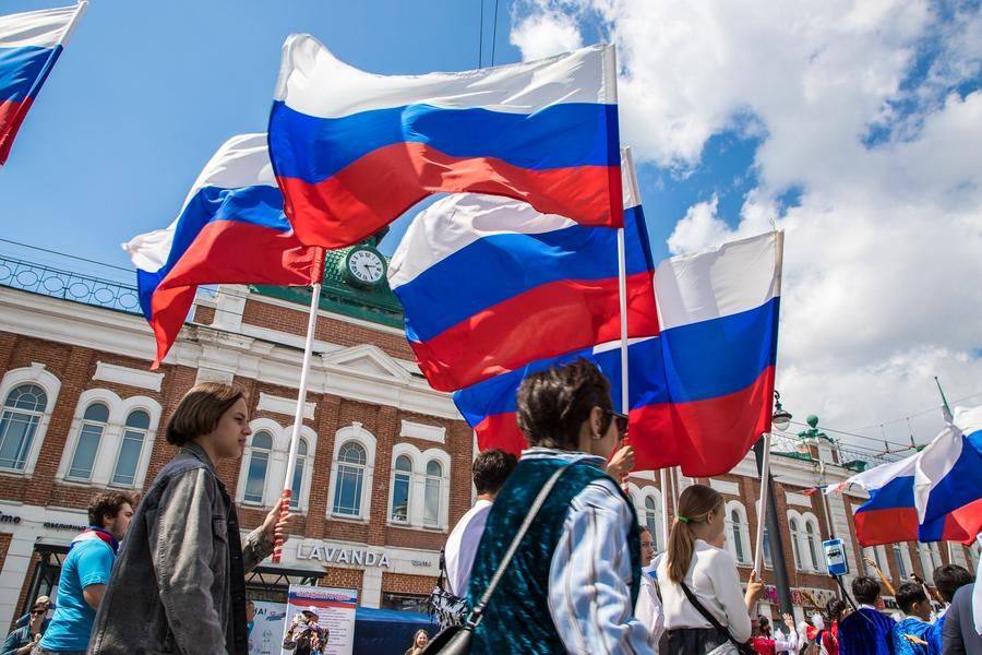 And all of them proudly march beneath the Russian flags