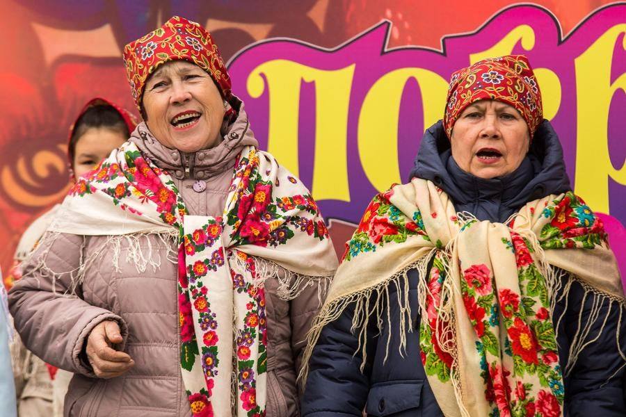 Meanwhile, the concert goes on. On stage are the keepers of tradition from Krestiki village