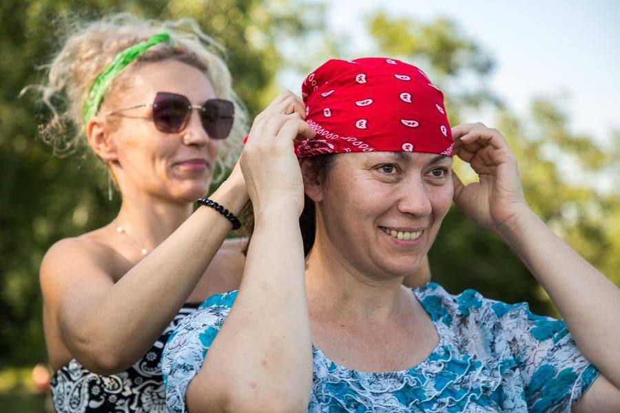 Tucking hair under a head covering is a hallmark of a responsible cook