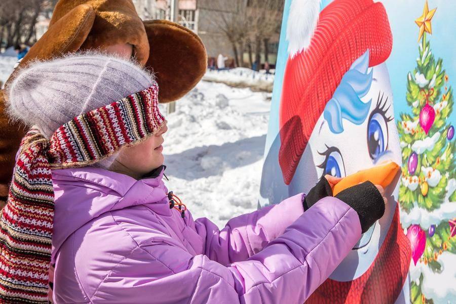 The carrot is meant to become the snowman’s nose — and many succeed