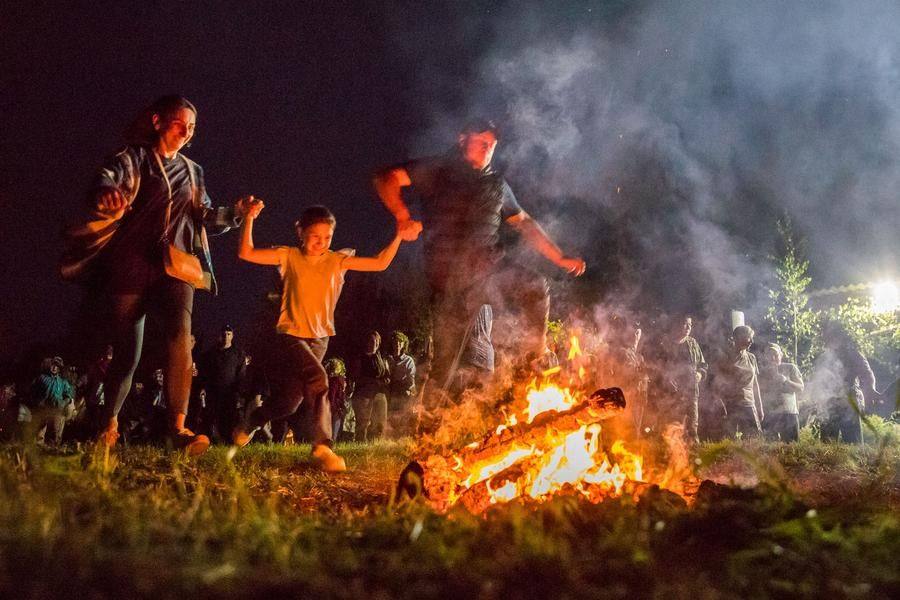Jumping over the main bonfire begins, now that it’s no longer dangerous