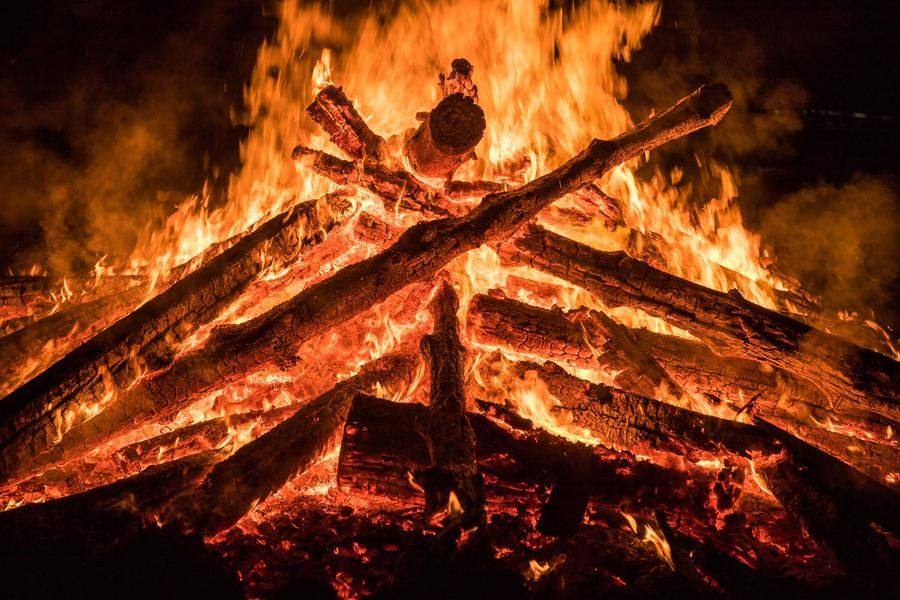 After midnight, the bonfires keep warding off evil spirits to protect the harvest