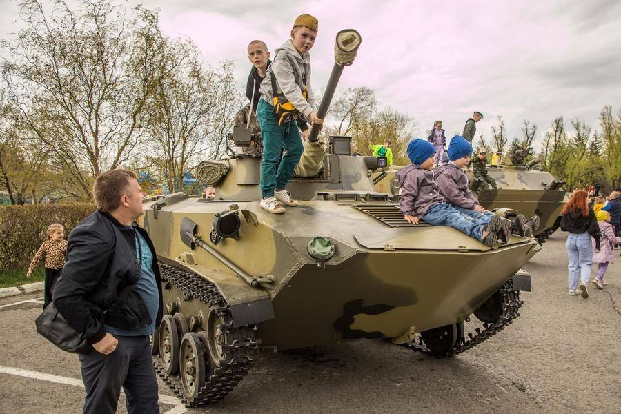 The traditional military equipment exhibition draws hundreds of kids