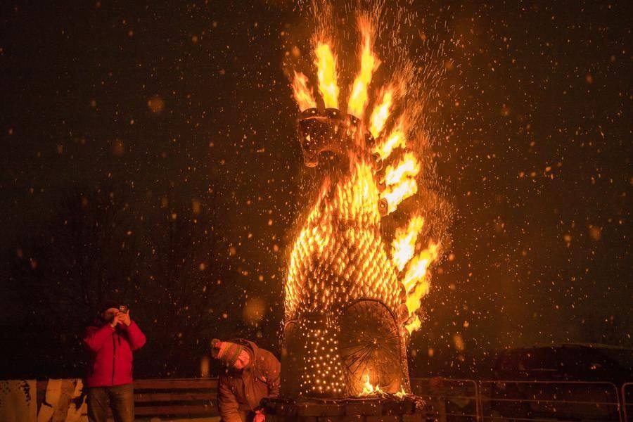 As the firewood is burning in the oven, the ceramist’s team takes memorable photos