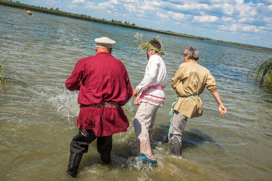 They carry him along the shortest possible route and toss him into the lake too