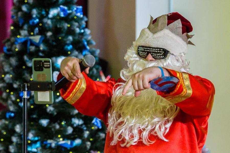 At first, Father Frost from Velikorusskoye village is all into modern trends…