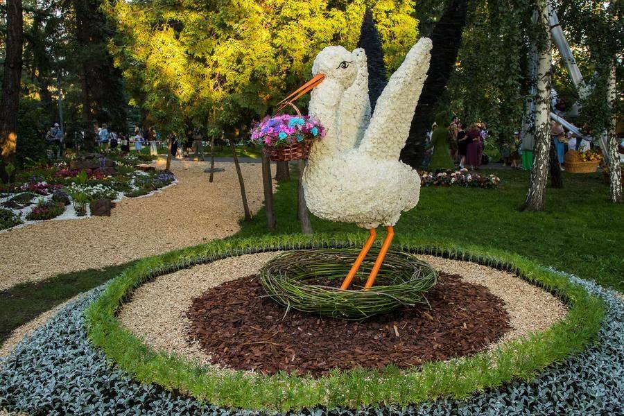 A stork is prominently displayed: according to legend, this bird brings babies