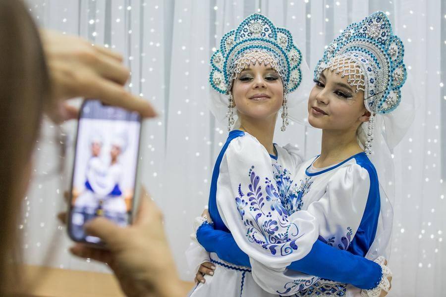 Parents are proud of their children and take keepsake photos