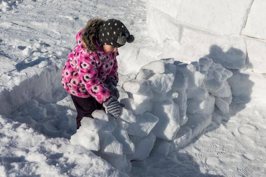 Meanwhile, the little ones are busy creating their own snow installations